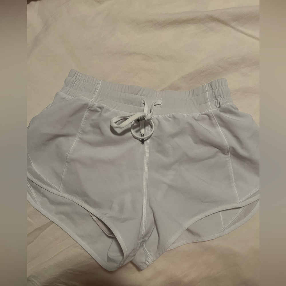 white athletic shorts, look just like lululemon hotty hot shorts